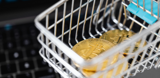 Impacto de las criptomonedas en el ocio y el entretenimiento Criptomonedas en un carrito de compra