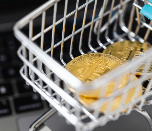 Impacto de las criptomonedas en el ocio y el entretenimiento Criptomonedas en un carrito de compra
