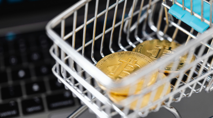 Impacto de las criptomonedas en el ocio y el entretenimiento Criptomonedas en un carrito de compra